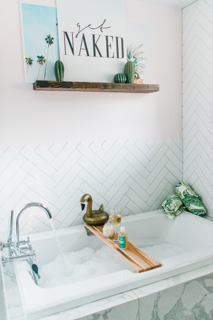 pink marble bathroom Get Naked sign tropical design herringbone chevron tile walls bathroom 